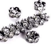 Rhinstens rondel. Klare sten. Bølget. Gunmetal. Grade A. 6 mm. 10 stk.